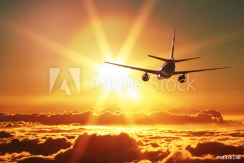 Picture of Plane is taking off at sunset